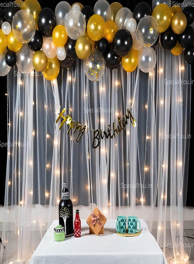 SpecialYou.in مجموعة زينة عيد ميلاد مميزة للأولاد من SpecialYou، تتضمن بالونات ذهبية وسوداء وبيضاء، وستائر بيضاء وإضاءة (بطول 40 قدمًا)، ومستلزمات زينة عيد ميلاد للزوج، ومجموعة زينة بالونات مكونة من 71 قطعة. - Image 1